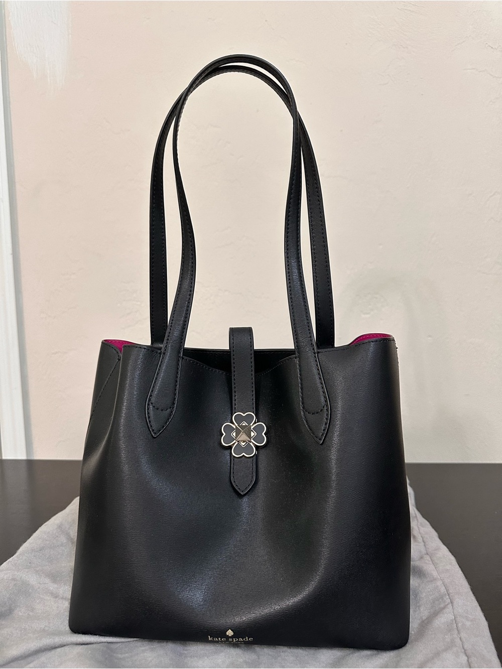kate spade Kaci Black Leather Tote w/hot pink Interior &Flower Clasp closure